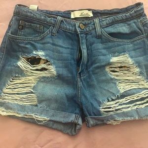 Cute cuffed hem distressed KanCan denim shorts!